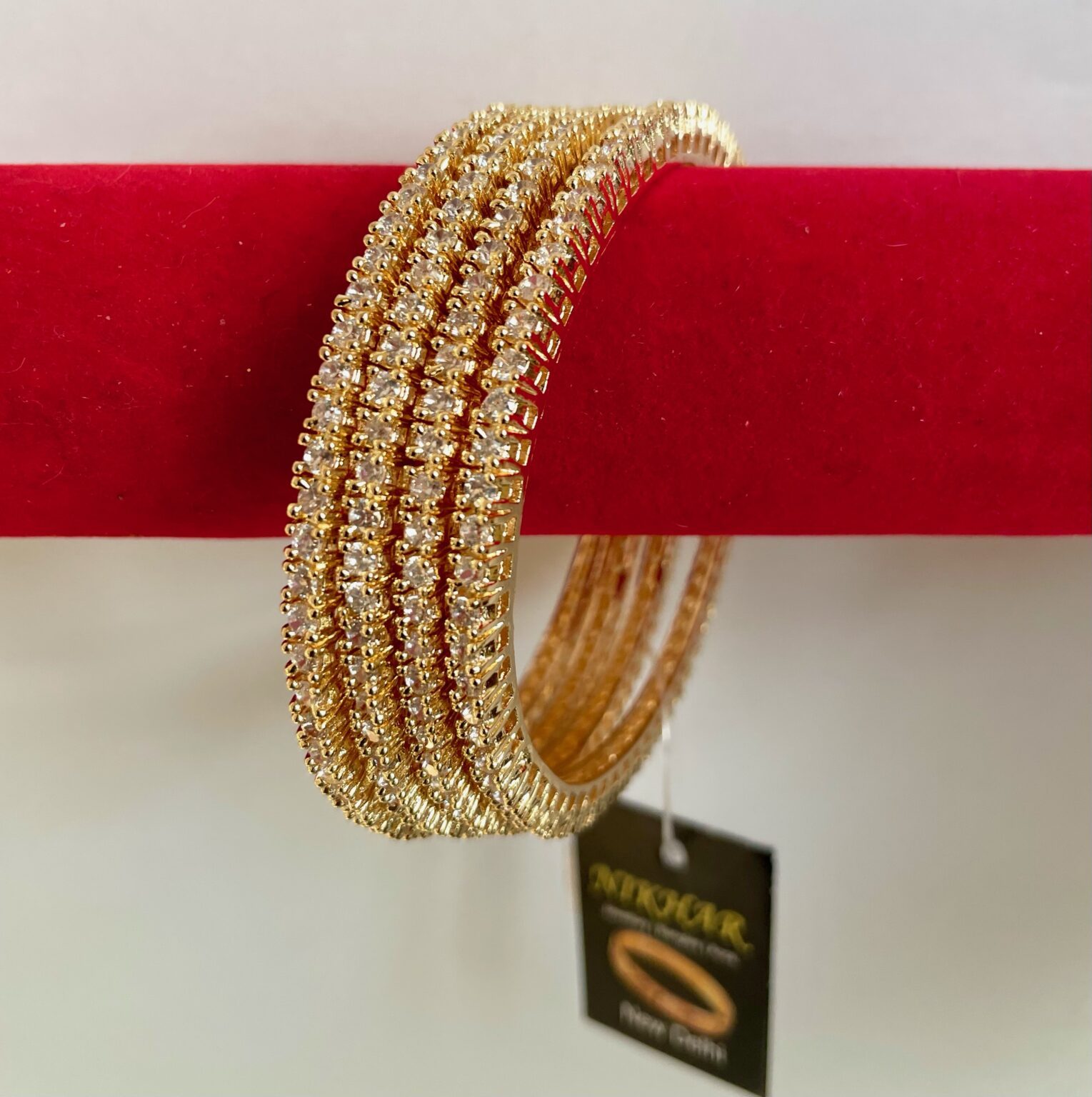 Amaira AD Stone Golden Bangles - Nikhar Jewellery